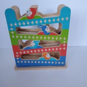 Melissa and Doug 
Roll and Ring Ramp Tower